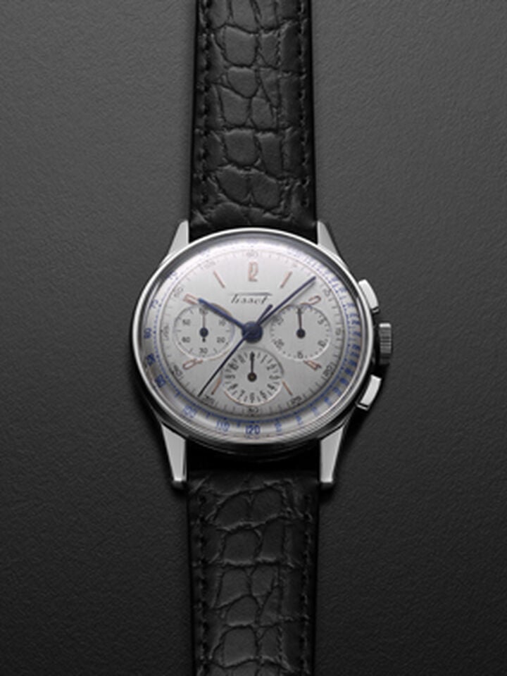 Vintage Tissot watch with black leather strap and steel case.