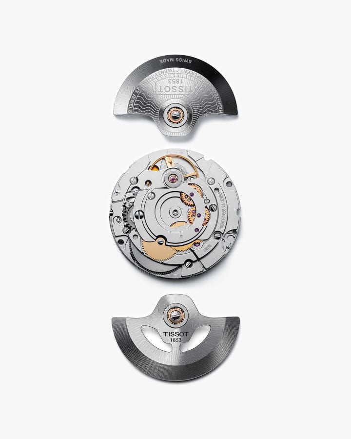 Movimiento de reloj automático Tissot, con rotor, masa oscilante y componentes detallados, incluyendo el logo Tissot 1853.
