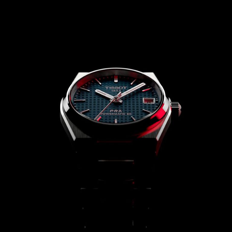 Teaser image of the New PRX 35 mm Automatic with blue dial 