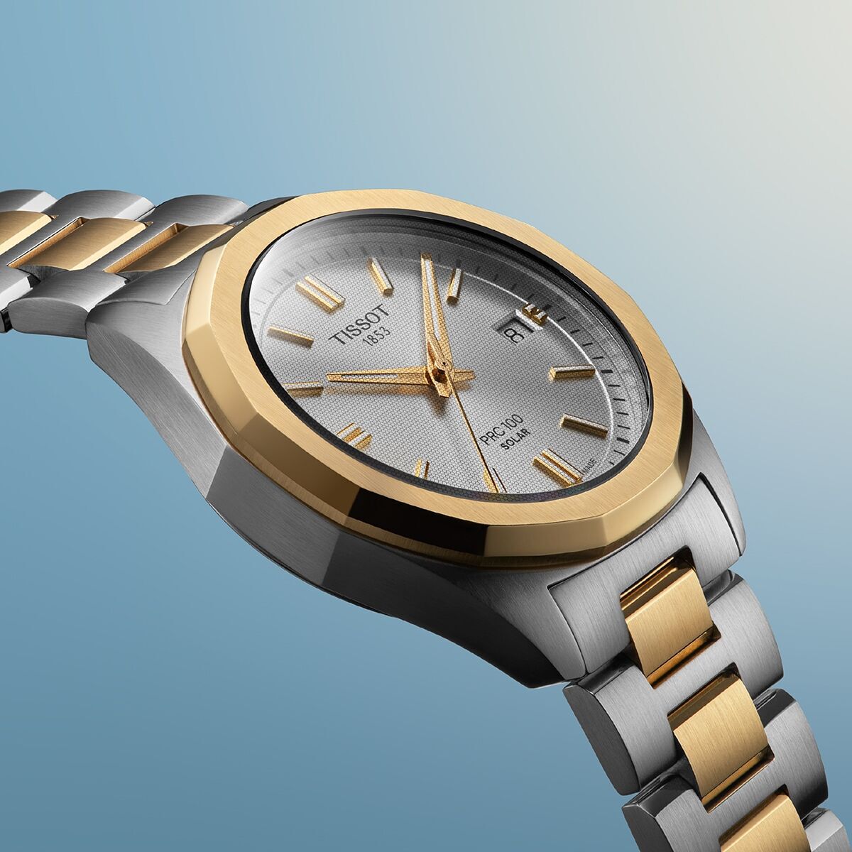 A close-up of the PRC 100 Solar in bi-colour yellow gold PVD model with silver dial and matching indexes
