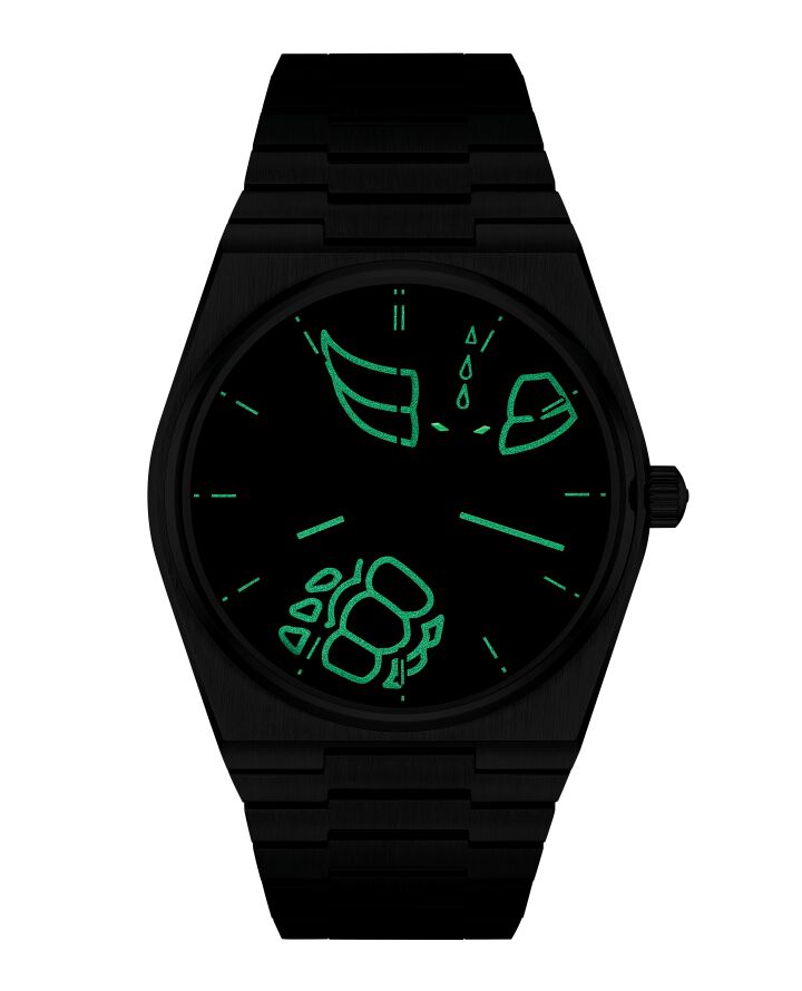 天梭 PRX UFO 格蘭戴澤 50 週年紀念款 40 毫米佩戴視覺圖，錶盤由 Super-Luminova® 技術點亮