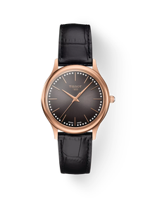 Front view of the watch Tissot Excellence 18K Gold 31.8mm with shadow