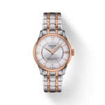 그림자가 있는 티쏘 슈망 데 뚜렐 파워매틱 80 34 mm 시계의 전면 보기