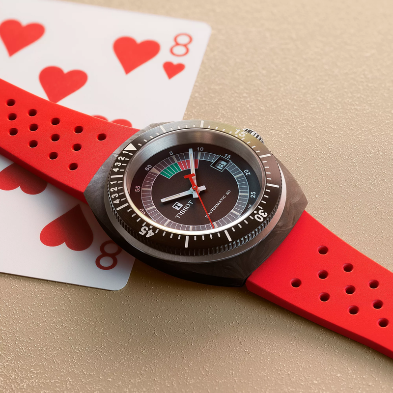 Tissot Sideral S 41mm reloj en un fondo de color