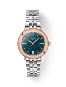 Front view of the watch Tissot Glendora Gold 33mm with shadow