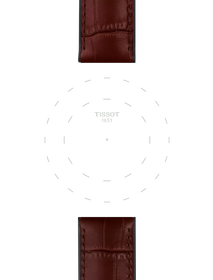 Enfoque en las asas de Correa marrón de piel y caucho oficial Tissot 22 mm