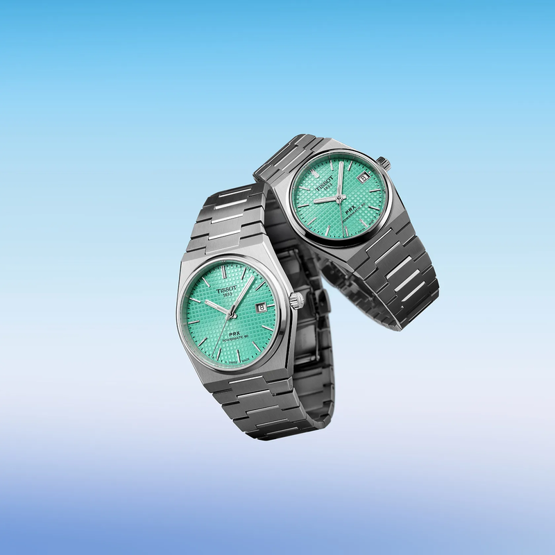 Tissot PRX 35mm watch on a colored background