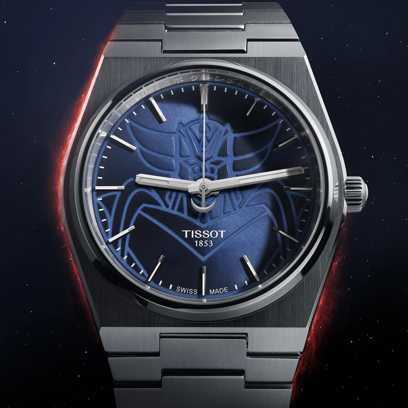 Tissot PRX UFO Robot Goldorak 40mm watch on a colored background