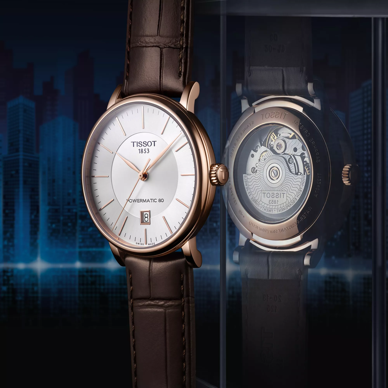 Tissot Carson Premium Powermatic 80 watch on a colored background