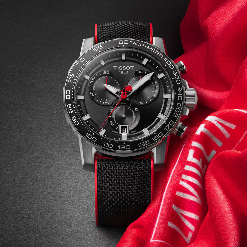 Tissot Supersport Chrono Vuelta Special Edition watch on a colored background