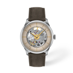 Front view of the watch Tissot Chemin Des Tourelles Skeleton 39mm with shadow