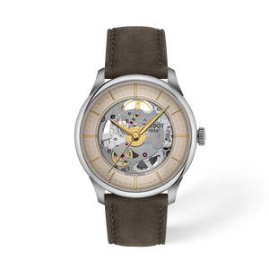 Front view of the watch Tissot Chemin Des Tourelles Skeleton 39mm with shadow