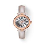Front view of the watch Tissot Glamorous Lady Automatic 18K Gold with shadow