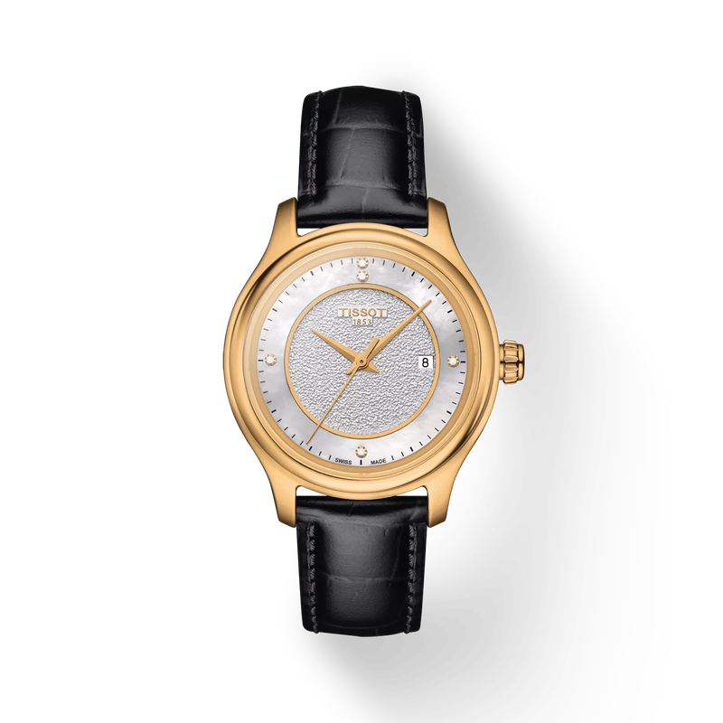 Vista frontal del reloj Tissot Fascination Lady 18K Gold con sombra