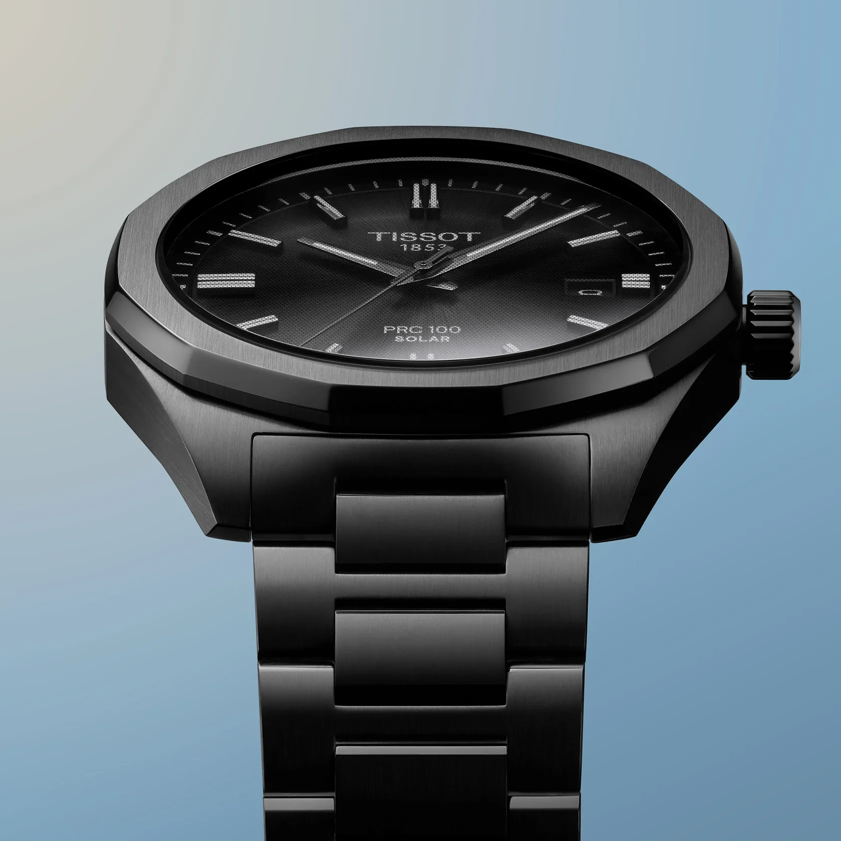 Tissot PRC 100 Solar 39mm watch on a colored background