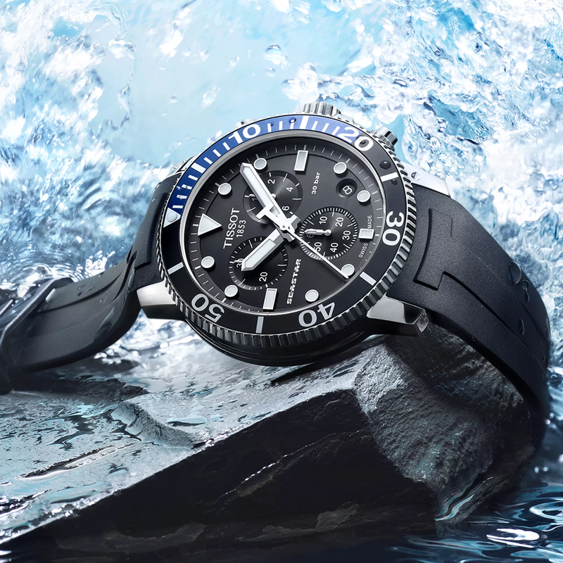 Tissot Seastar 1000 Quartz Chronograph watch on a colored background