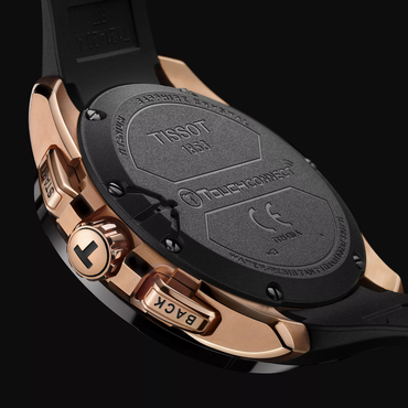Tissot T-Touch Connect Solar 47.5mm watch on a coloured background