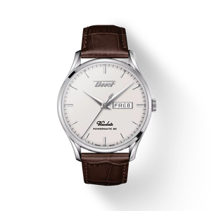 Front view of the watch Tissot Heritage Visodate Powermatic 80 with shadow