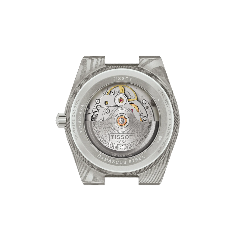 Vue arrière du boîtier de la montre Tissot PRX Acier Damas 38mm