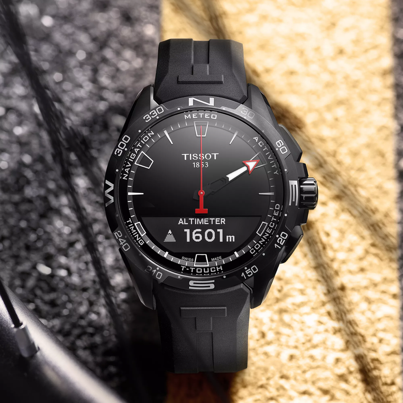 Tissot T-Touch Connect Solar 47.5mm watch on a colored background