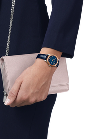 Simulation of the watch Tissot le Locle Gold 29mm on a wrist