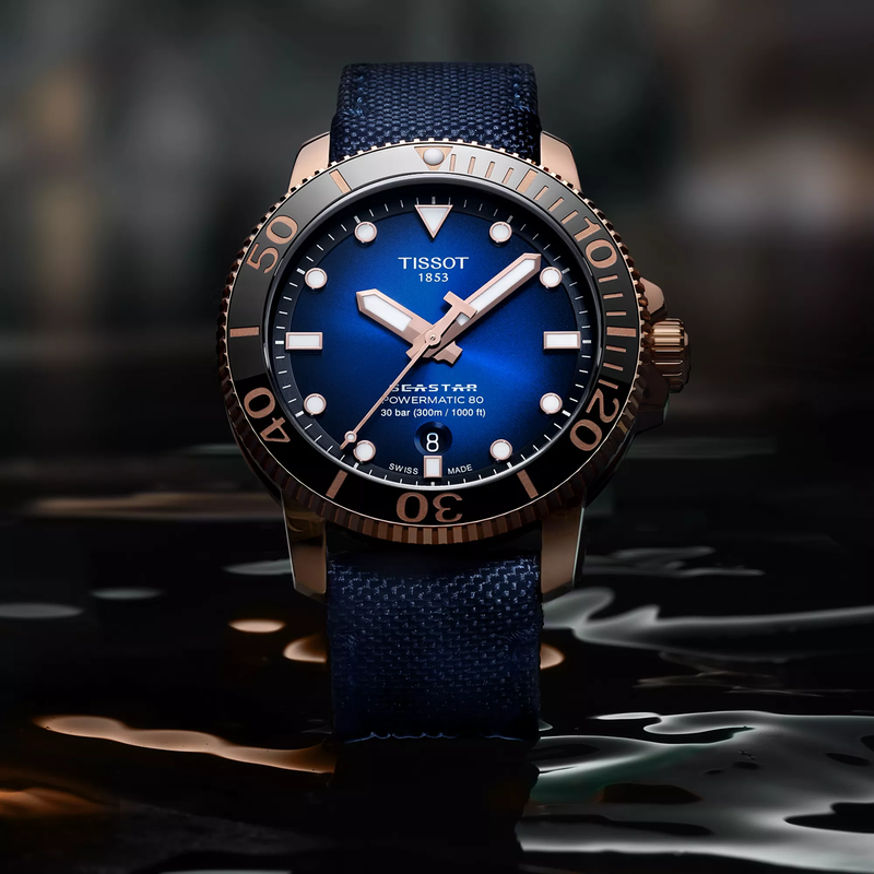 Tissot Seastar 1000 Powermatic 80 watch on a colored background