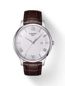 그림자가 있는 티쏘 트래디션 시계의 전면 보기