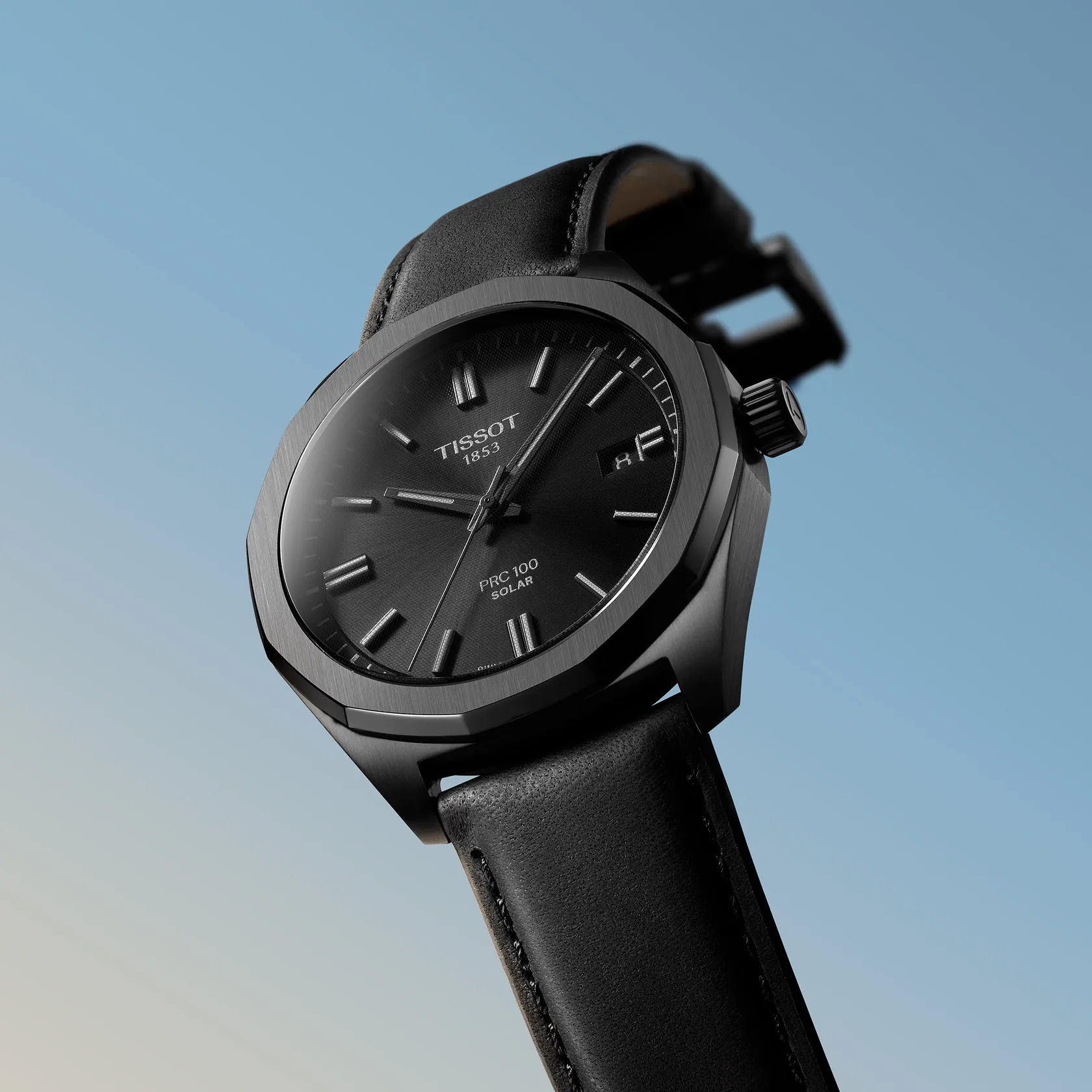 Tissot PRC 100 Solar 39mm watch on a colored background