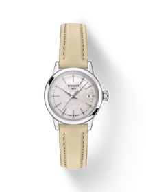 그림자가 있는 티쏘 클래식 드림 레이디 시계의 전면 보기