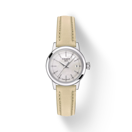 그림자가 있는 티쏘 클래식 드림 레이디 시계의 전면 보기