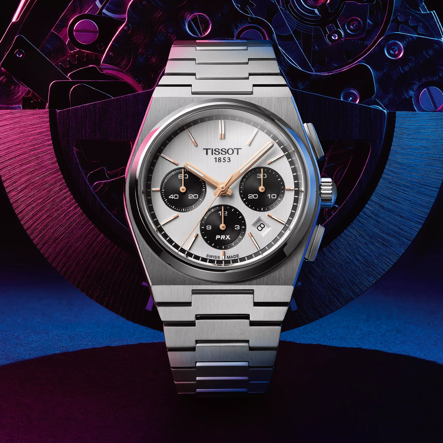 Tissot PRX 42mm watch on a colored background