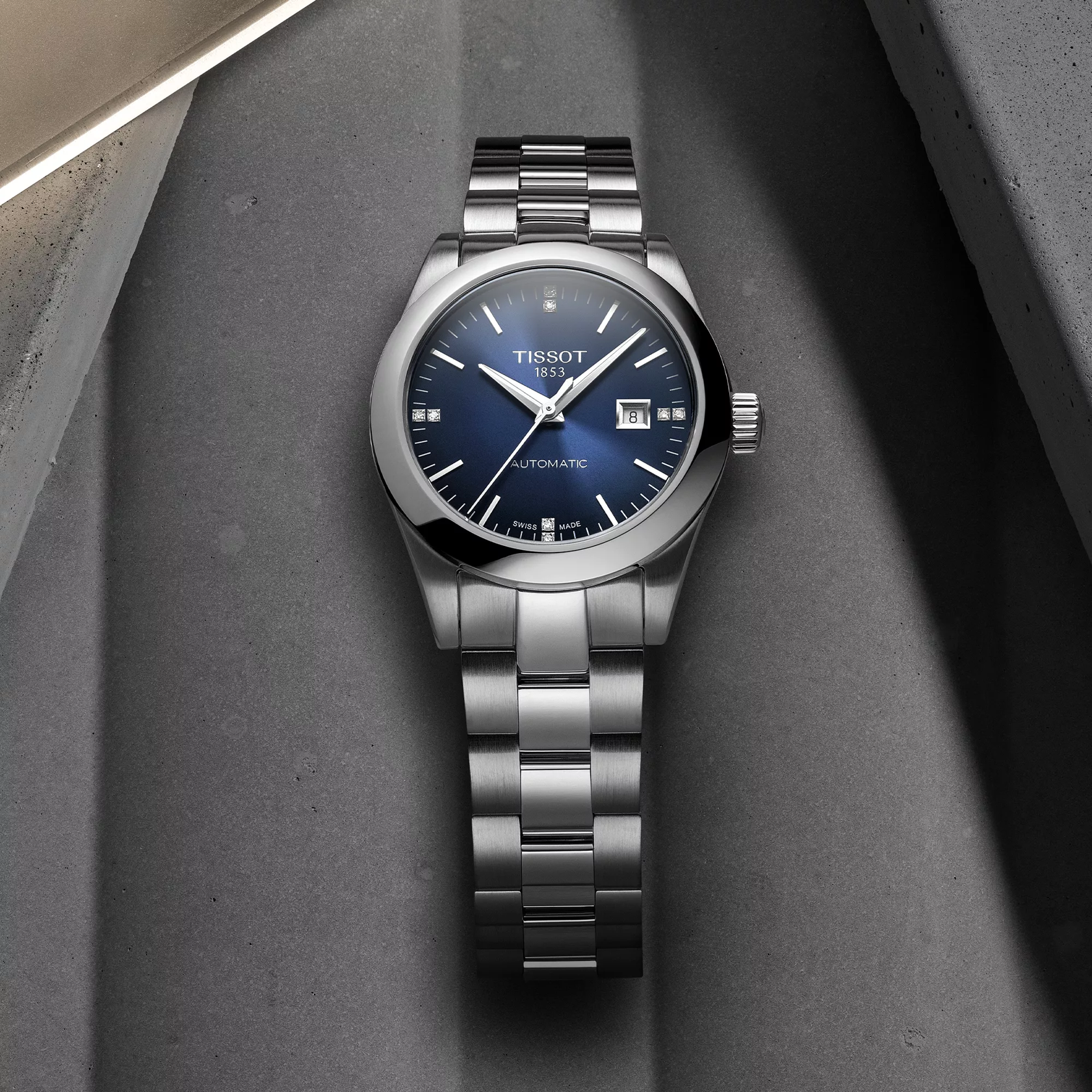 Tissot T-My Lady Automatic watch on a colored background