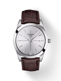 그림자가 있는 티쏘 젠틀맨 시계의 전면 보기