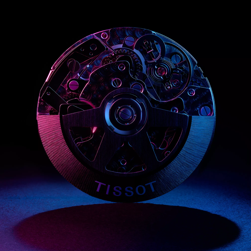 Tissot PRX 42mm watch on a colored background