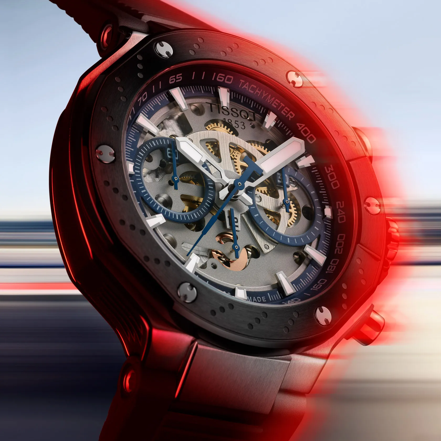 Tissot T-Race MotoGP 2025 45mm reloj en un fondo de color