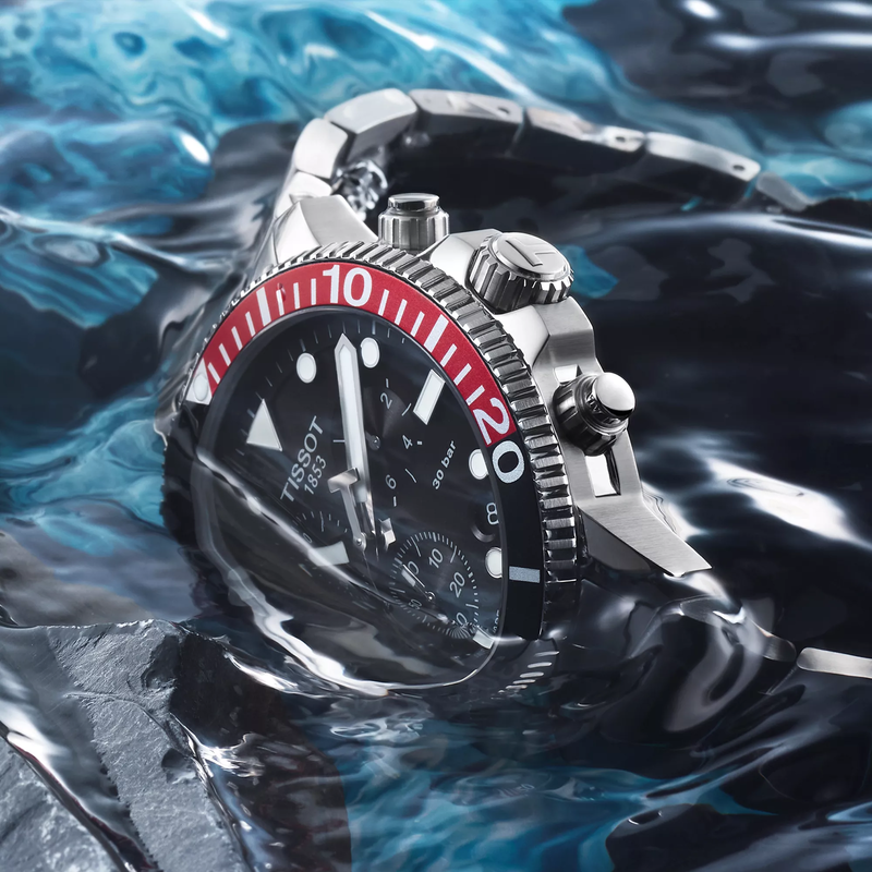 Tissot Seastar 1000 Chronograph watch on a colored background