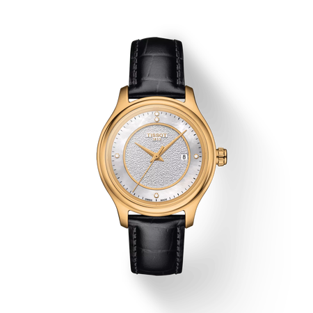 Vista frontal del reloj Tissot Fascination Lady 18K Gold con sombra