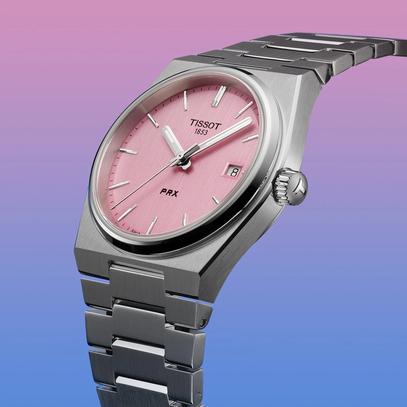 Tissot PRX 35mm watch on a colored background
