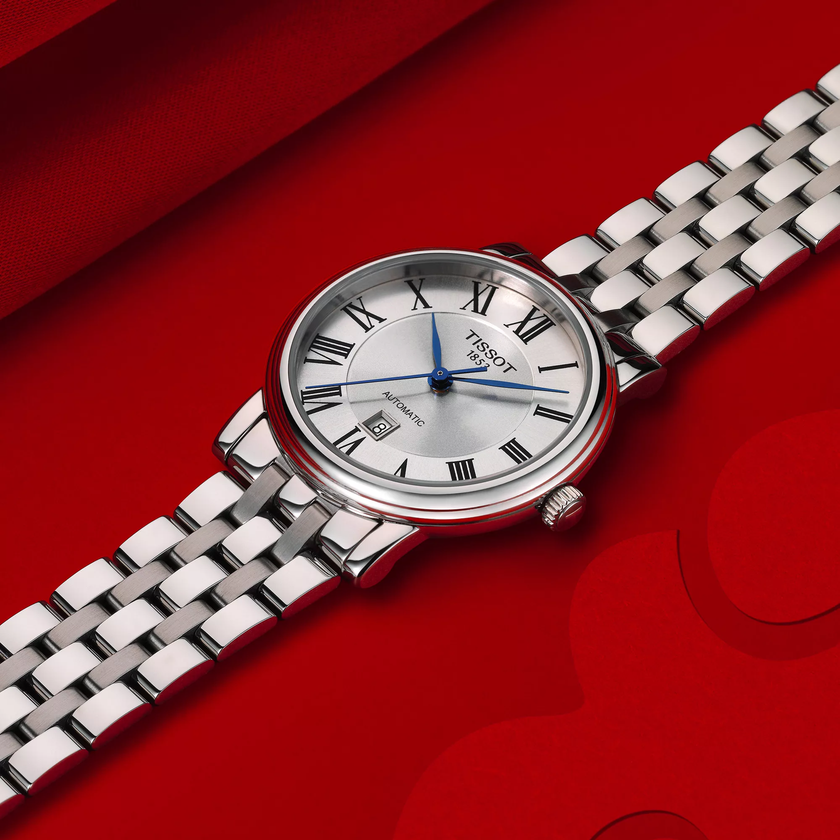 Tissot Carson Premium Automatic lady watch on a colored background