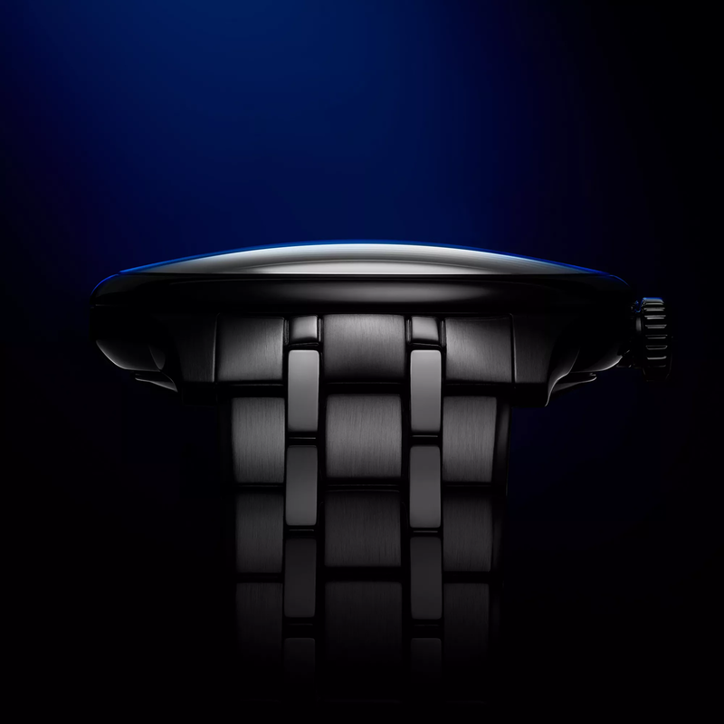 Tissot Chemin des Tourelles Powermatic 80 39 mm watch on a colored background