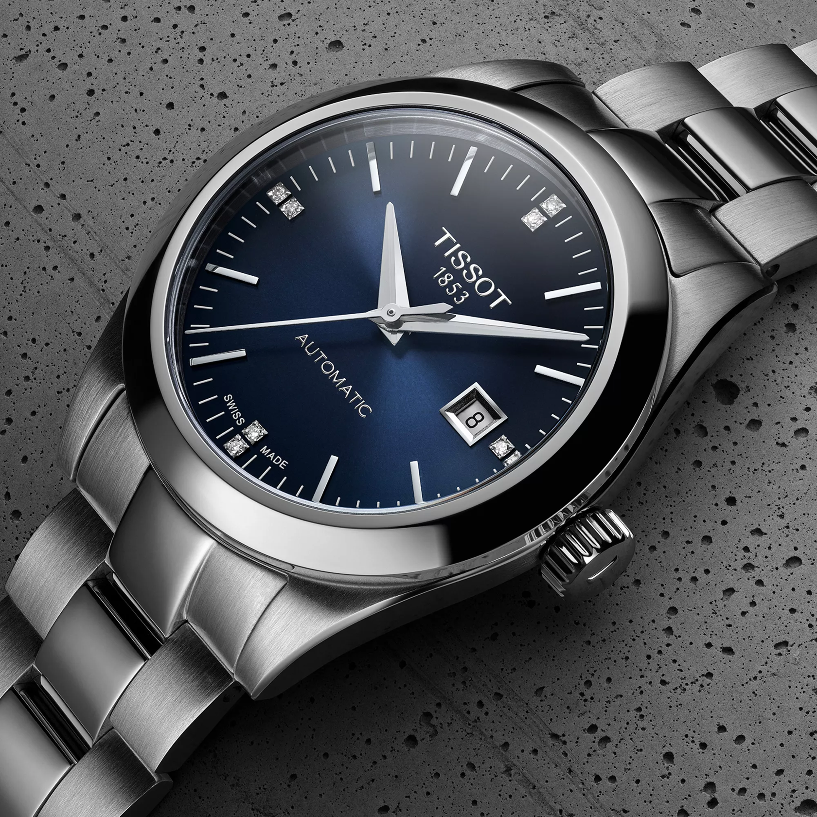 Tissot T-My Lady Automatic watch on a colored background