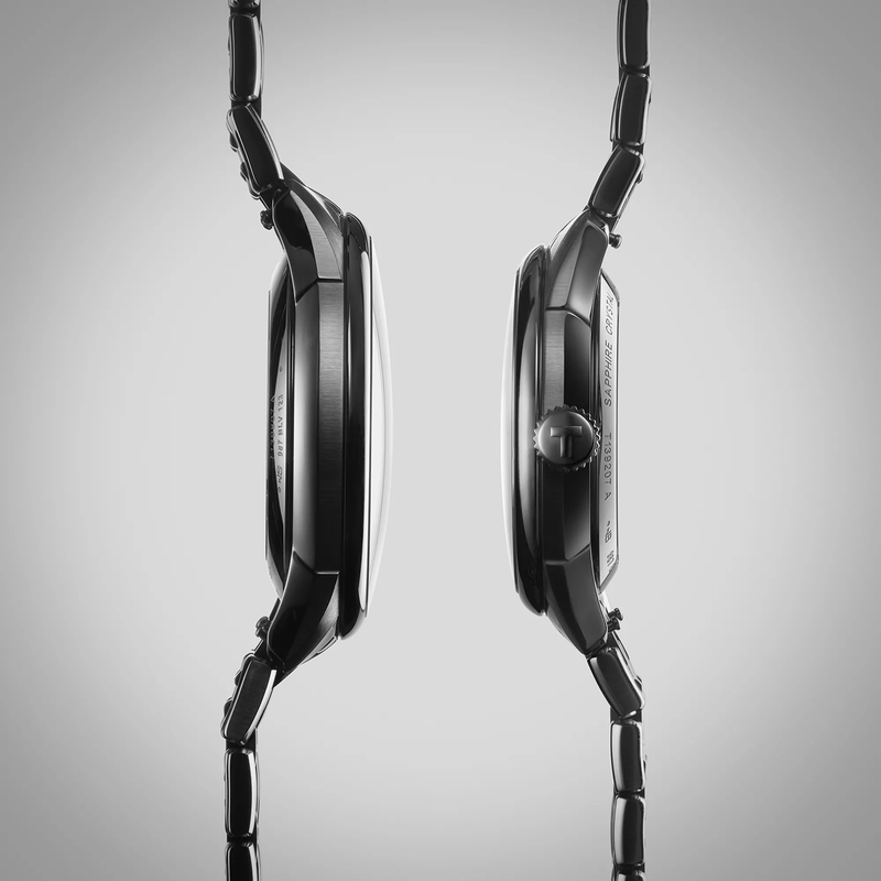 Tissot Chemin des Tourelles Powermatic 80 39 mm watch on a colored background