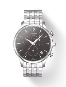 Front view of the watch Tissot Tradition Chronograph with shadow
