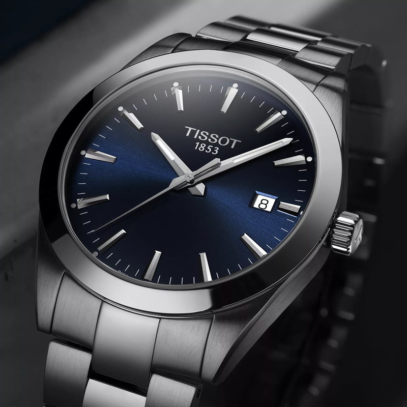 Tissot Gentleman 40mm watch on a coloured background
