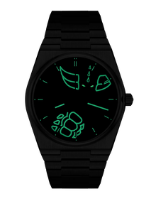 Front view of the watch Tissot PRX UFO Robot Grendizer 50th Anniversary 40mm in night mode