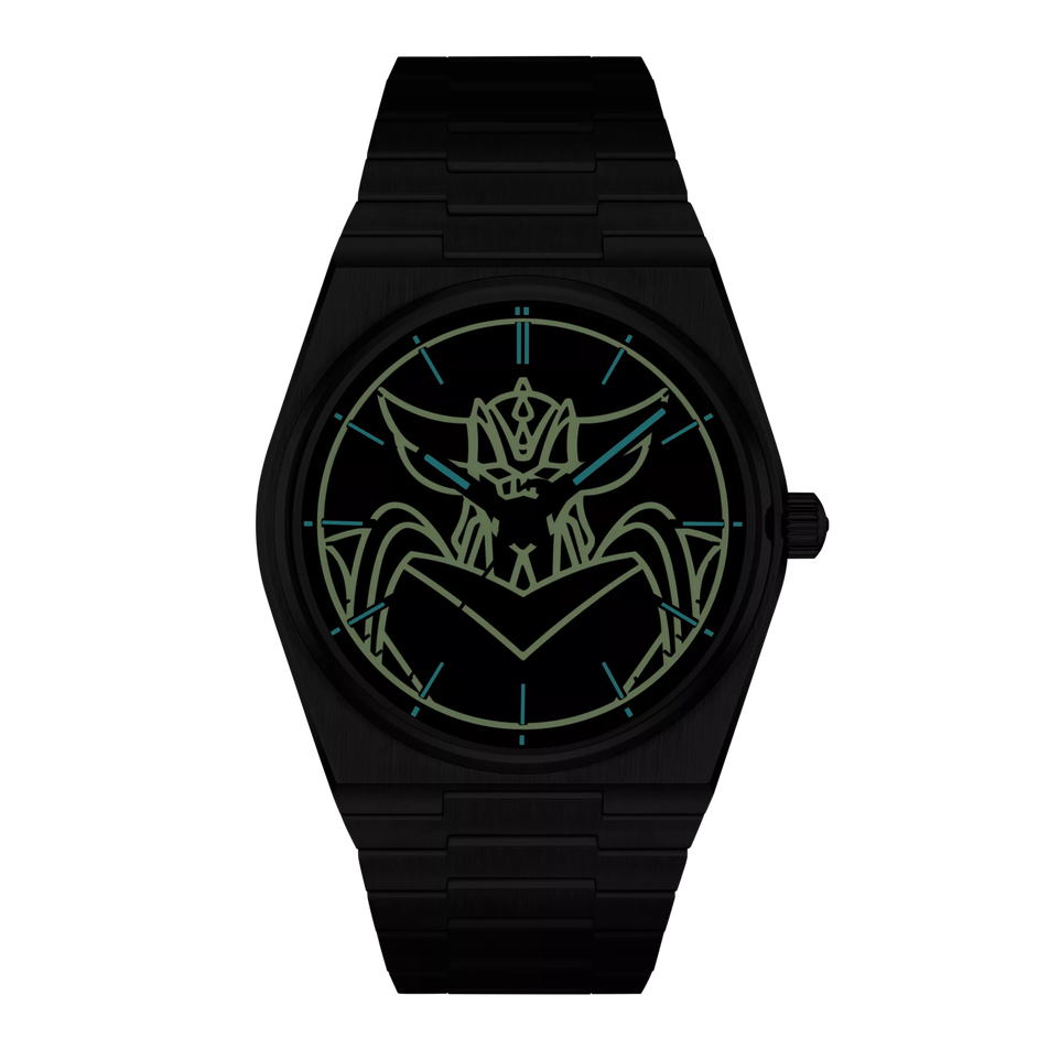 Front view of the watch Tissot PRX UFO Robot Grendizer 40mm in night mode