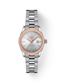 그림자가 있는 티쏘 T-마이 레이디 오토매틱 18K 골드 베젤 시계의 전면 보기