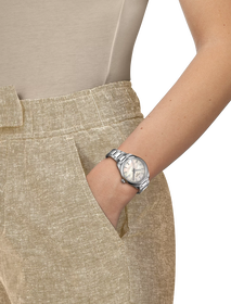 Simulation de la montre Tissot PR 100 34mm sur un poignet