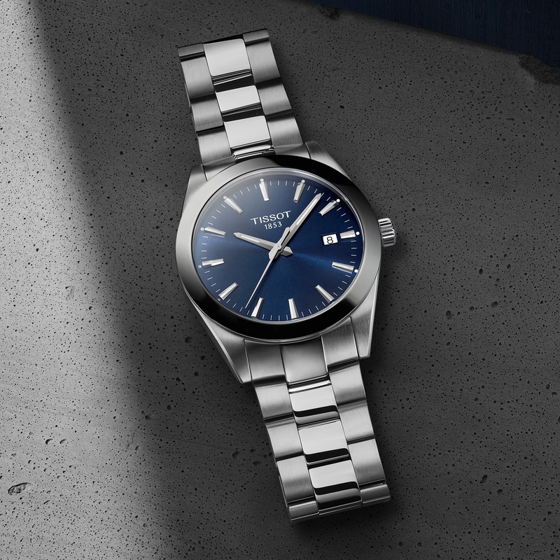 Tissot Gentleman 40mm watch on a colored background