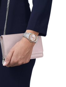 Simulation of the watch Tissot PRX Gold 35mm on a wrist